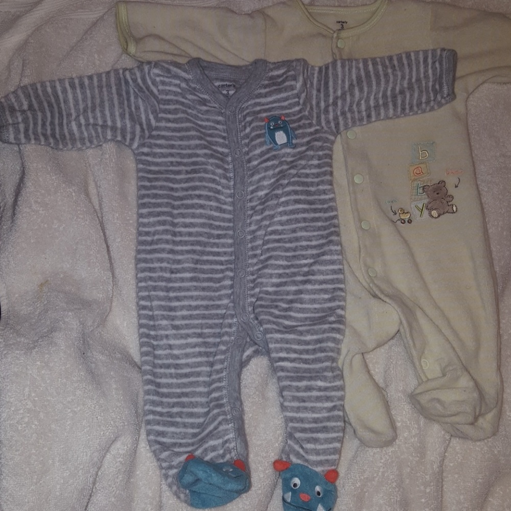2 Carter's sleepers with footies. Size 6 months